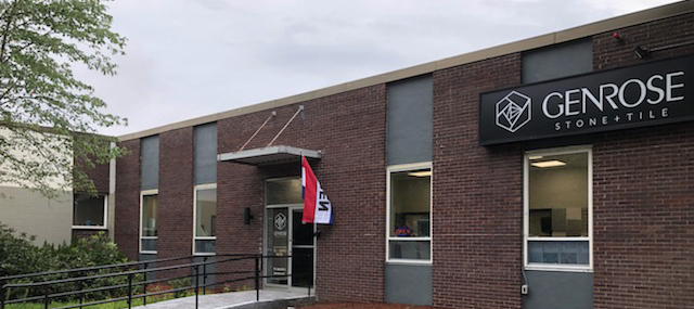 Genrose Stone & Tile storefront with a red and white flag.