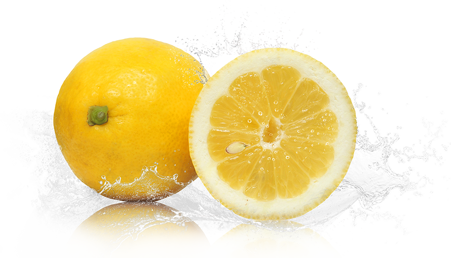 Whole and sliced yellow lemon with water splashes.