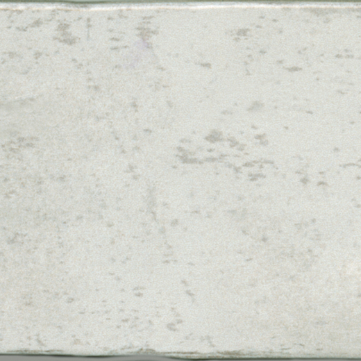 Glossy chalk-colored ceramic tile.